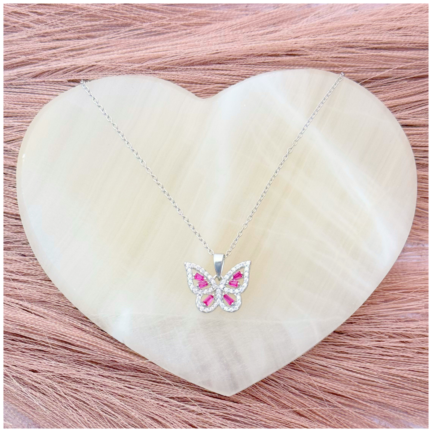 CADENA DIJE MARIPOSA CIRCONIAS BLANCA Y ROJAS EN PLATA .925 RODIO