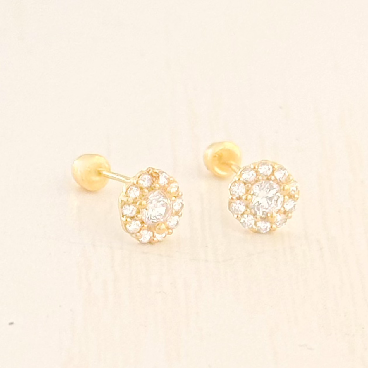 BROQUEL ROSETON ZIRCONIA ORO 10K