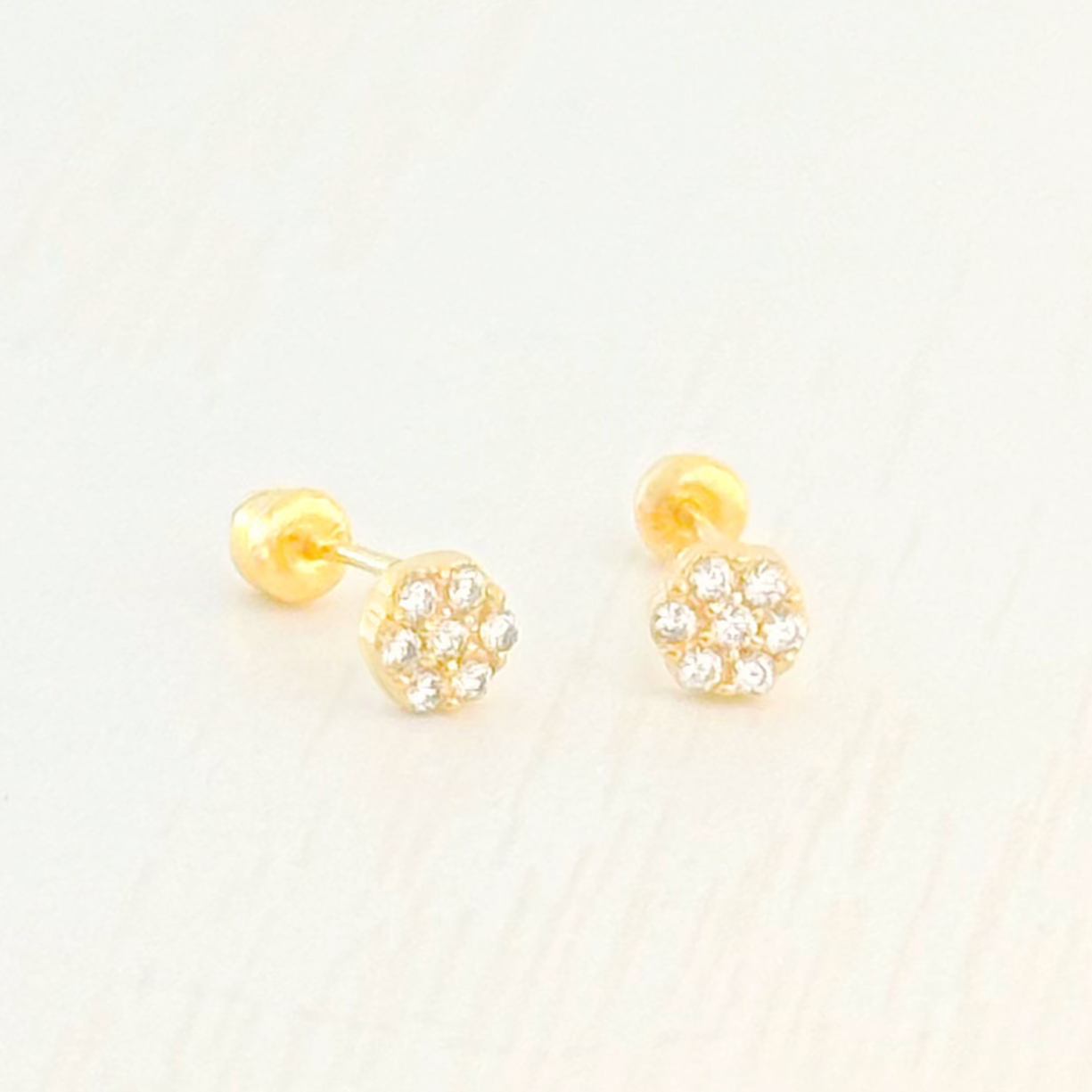 BROQUEL ROSETA VAC ZIRCONIAS ORO 10K