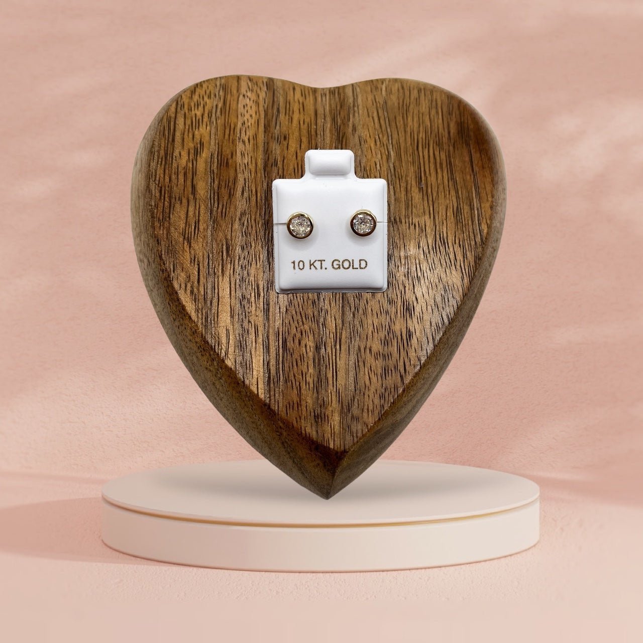 BROQUEL REDONDO BISEL ZIRCONIA 5 ORO 10K