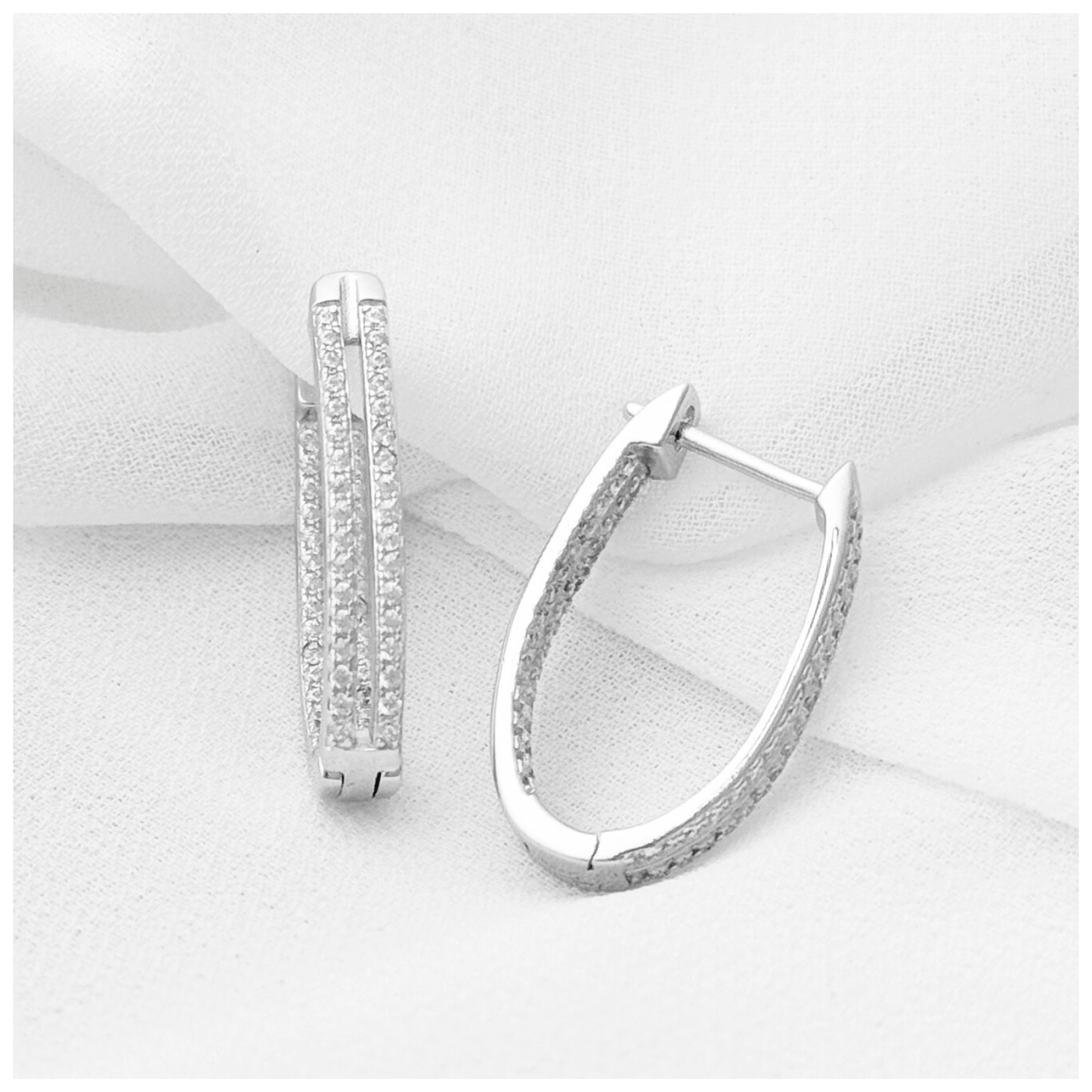 ARETE DOBLE CON CIRCONIA PLATA .925 RODIO