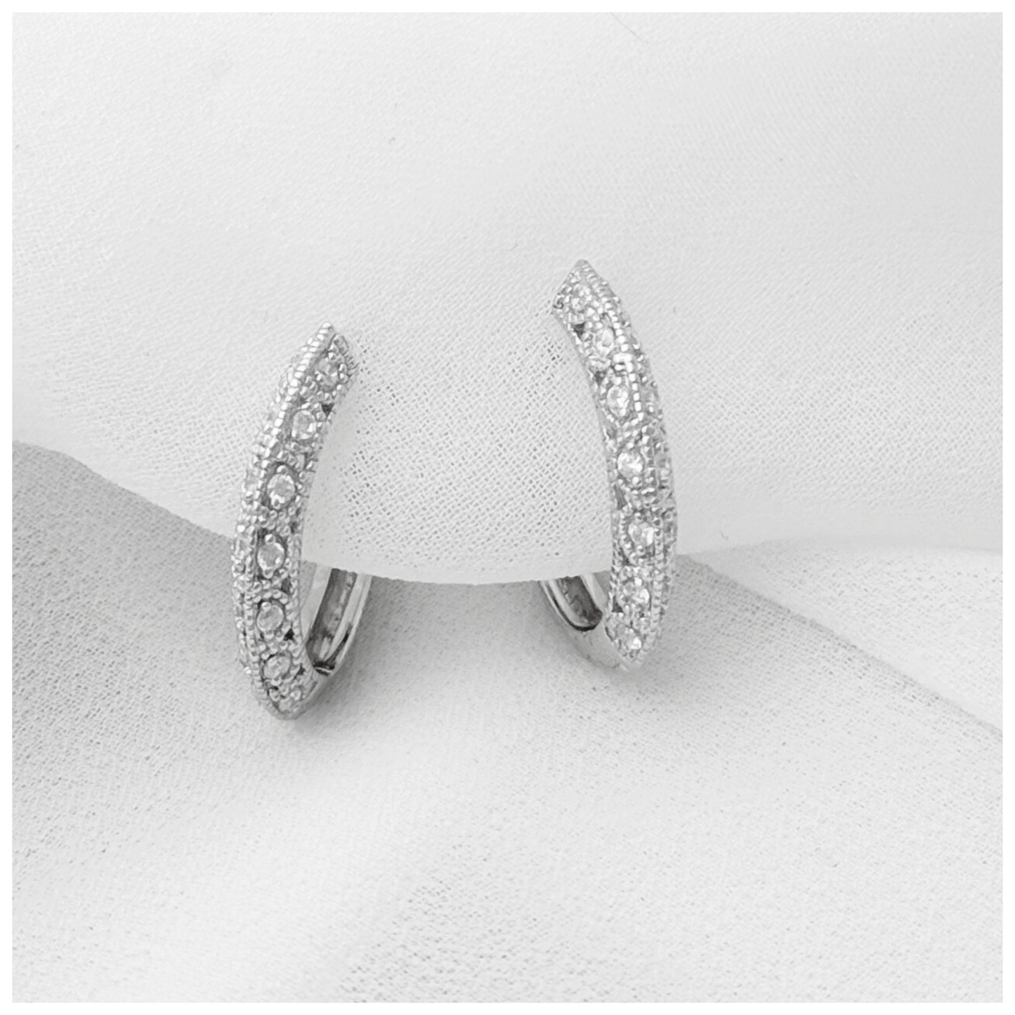 ARETE CON CIRCONIA PAVE PLATA .925 RODIO