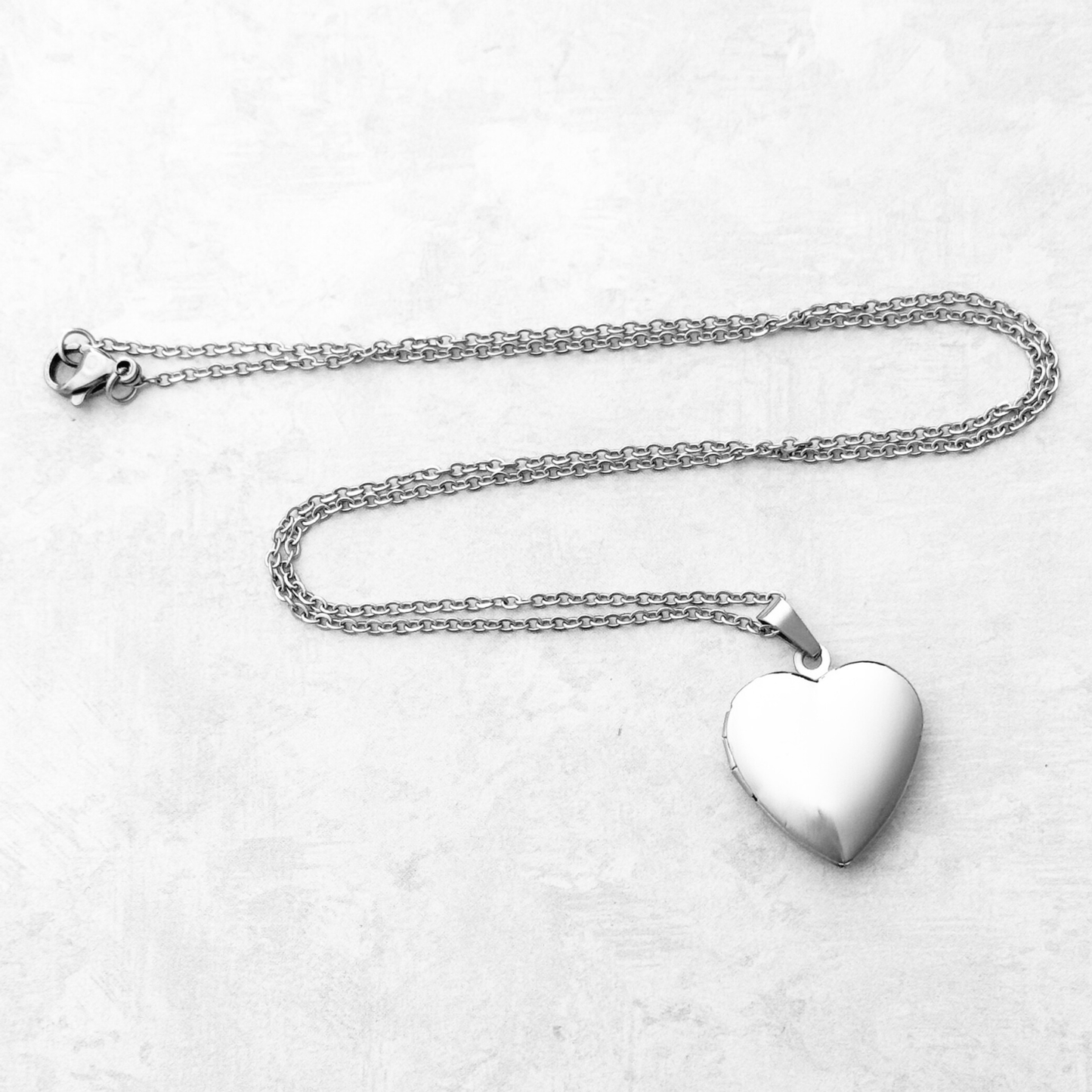 GARGANTILLA CORAZON RELICARIO ACERO