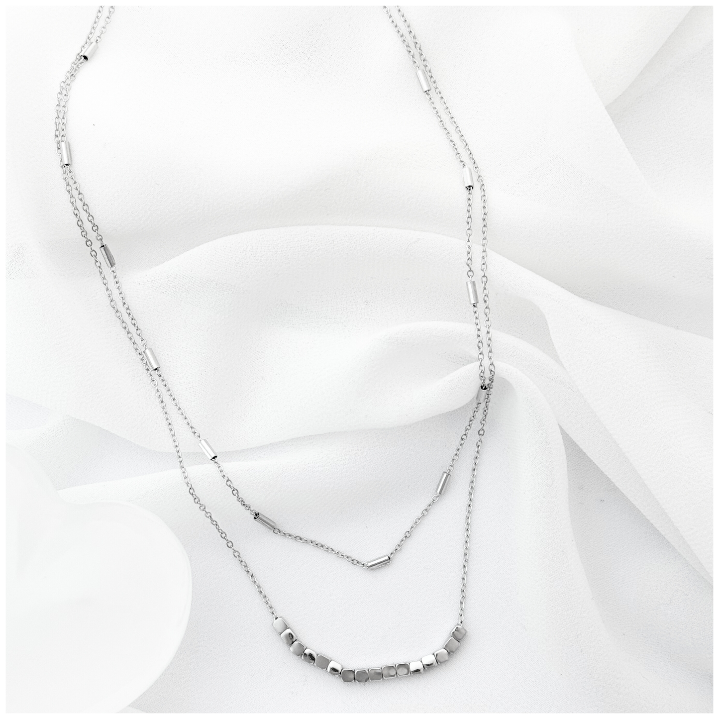 GARGANTILLA DOBLE BARRA CUBO ACERO