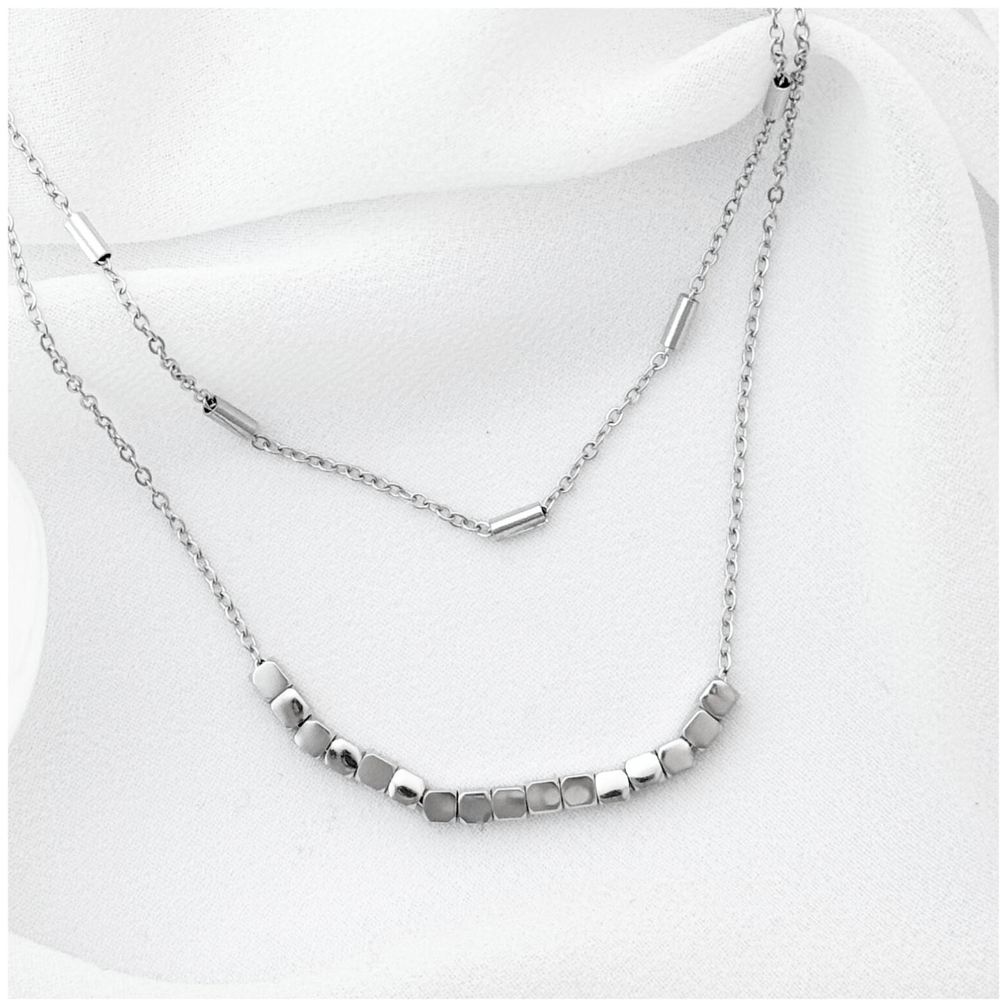 GARGANTILLA DOBLE BARRA CUBO ACERO