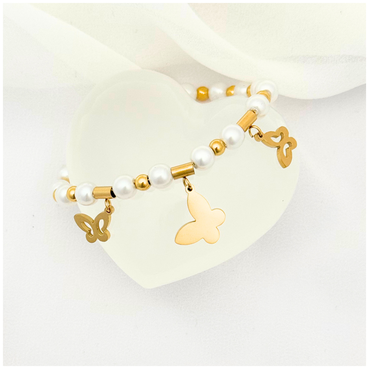 PULSERA MARIPOSA PERLA ACERO DORADO
