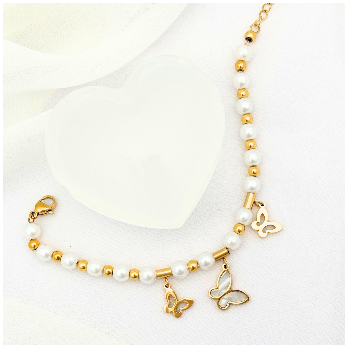 PULSERA MARIPOSA PERLA ACERO DORADO
