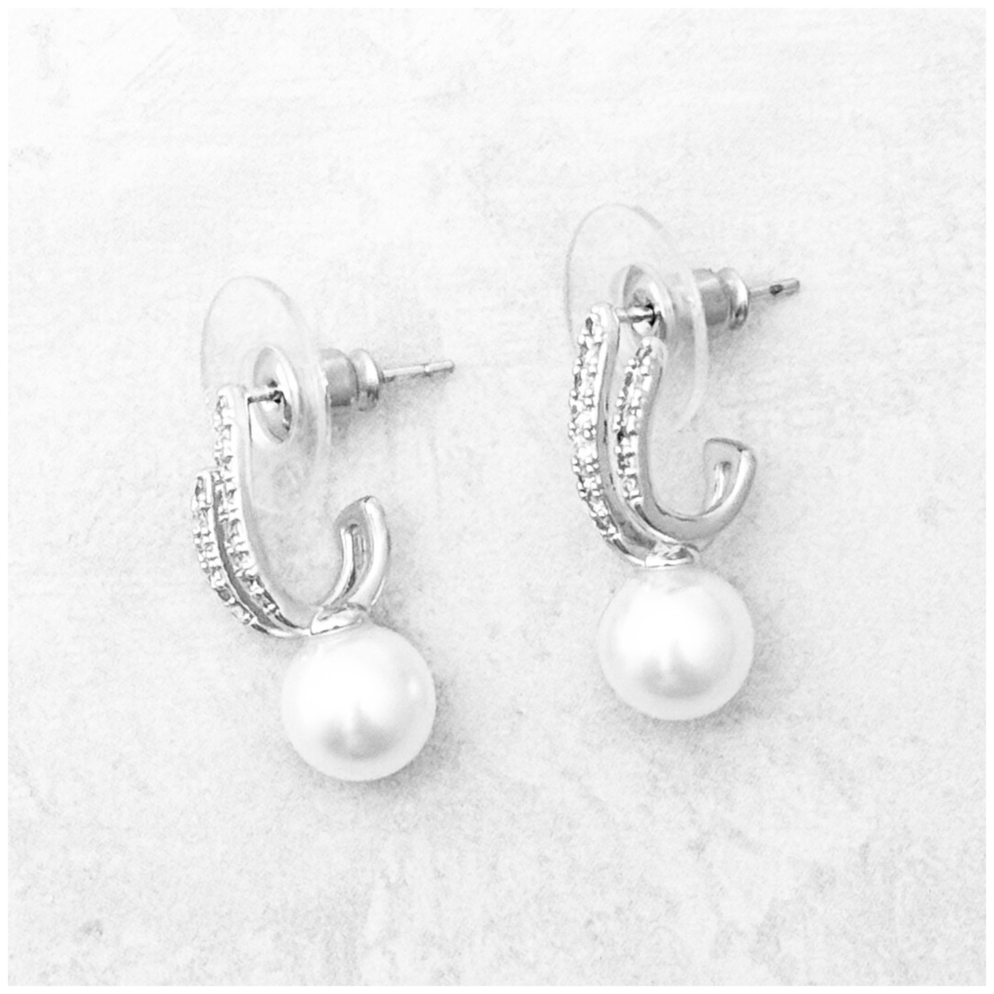 ARETE DOS BARRAS PERLA ORO LAMINADO BLANCO