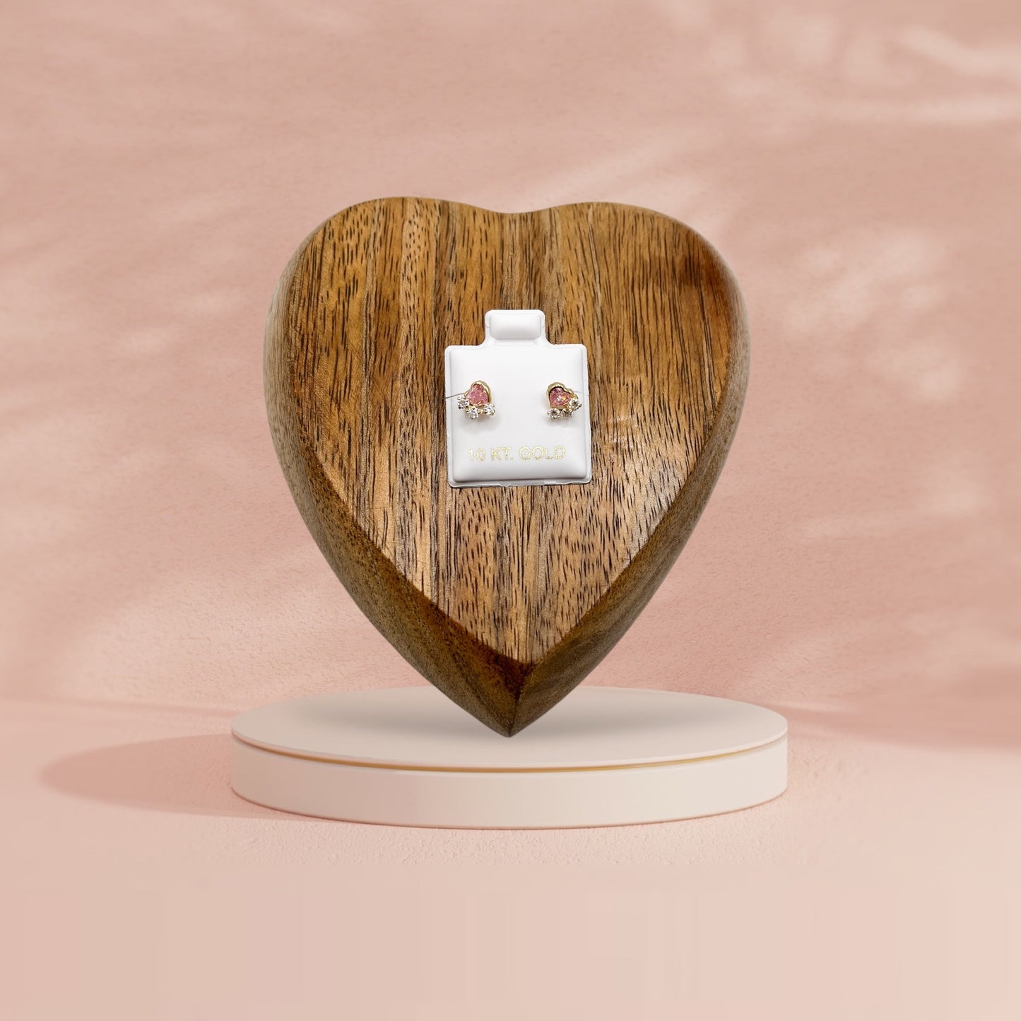 BROQUEL CORAZON ROSA BISEL 3 ZIRCONIAS ORO 10K