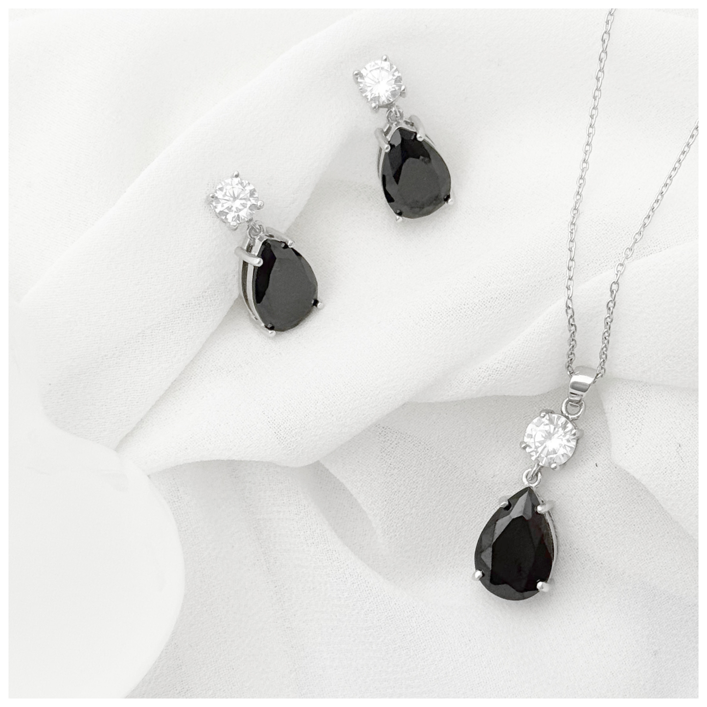 SET DIJE EN FORMA DE LAGRIMA EN CIRCONIA NEGRA Y BLANCA PLATA .925 RODIO