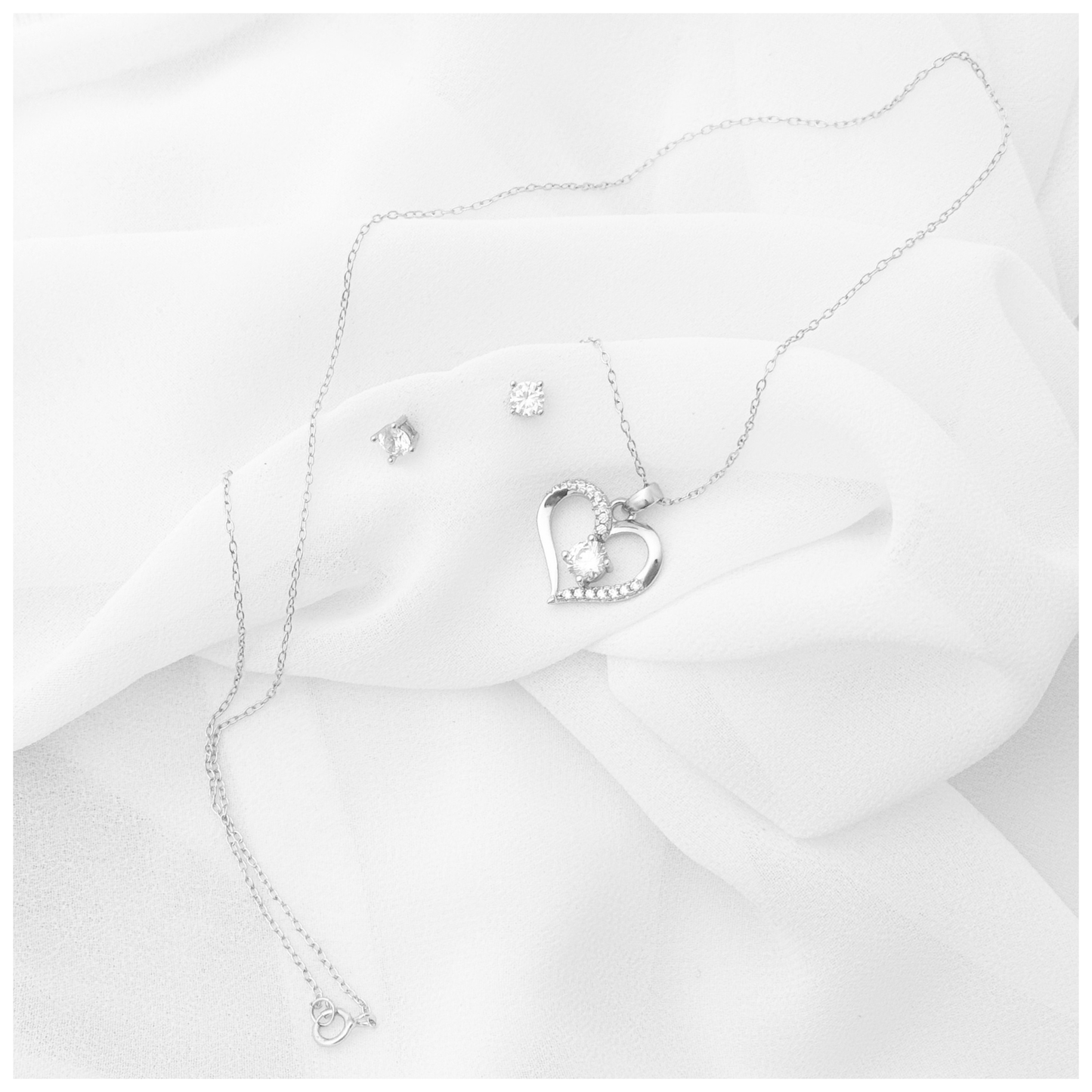 SET CORAZON CIRCONIAS PLATA .925 RODIO