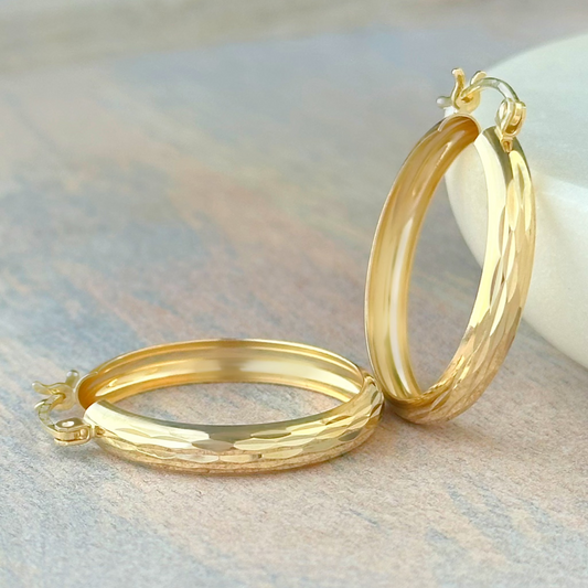 ARRACADA DIAMANTADA RAYAS ORO 10K
