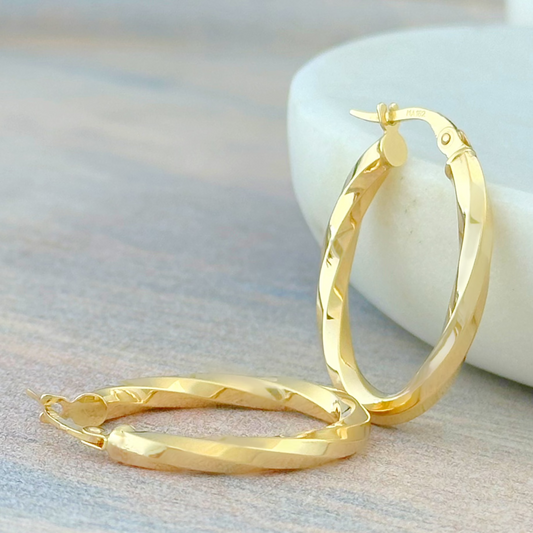 ARRACADA OVAL OLAS ORO 10K