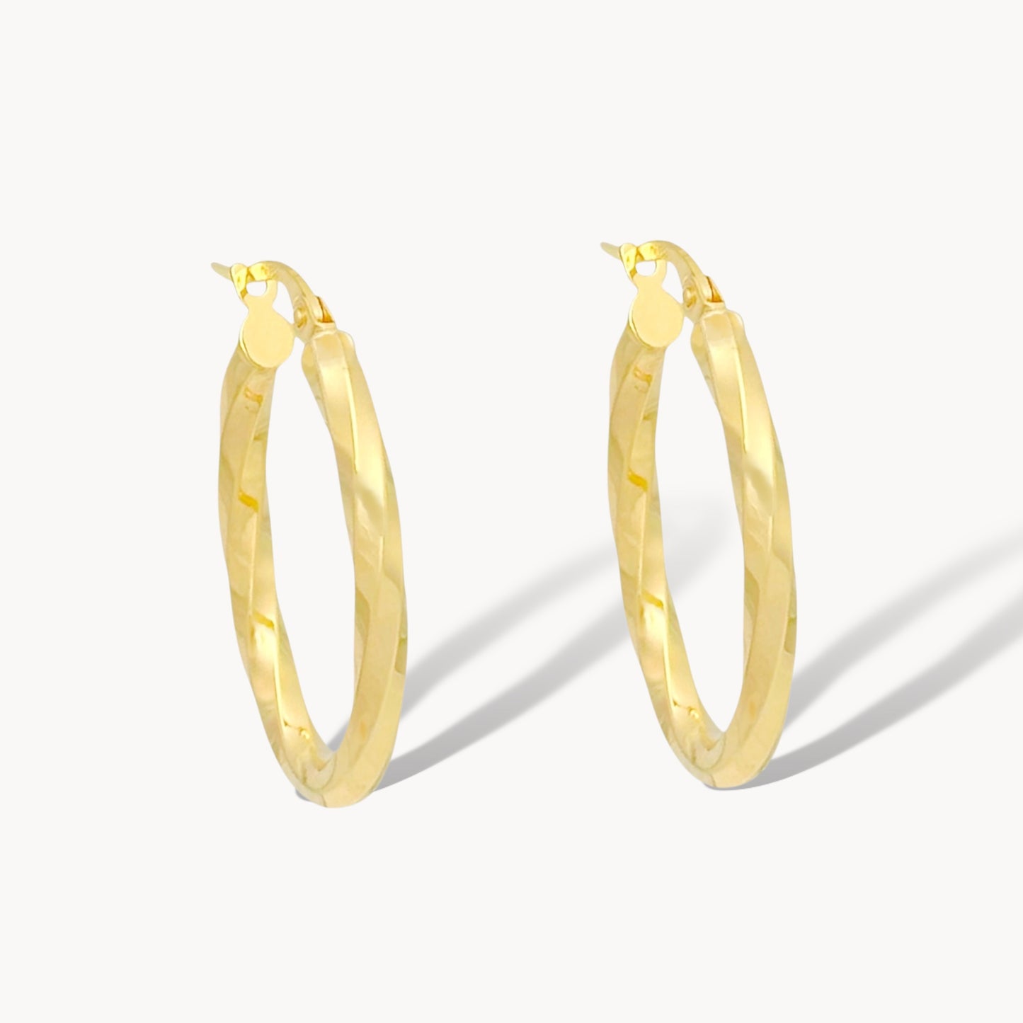 ARRACADA OVAL OLAS ORO 10K